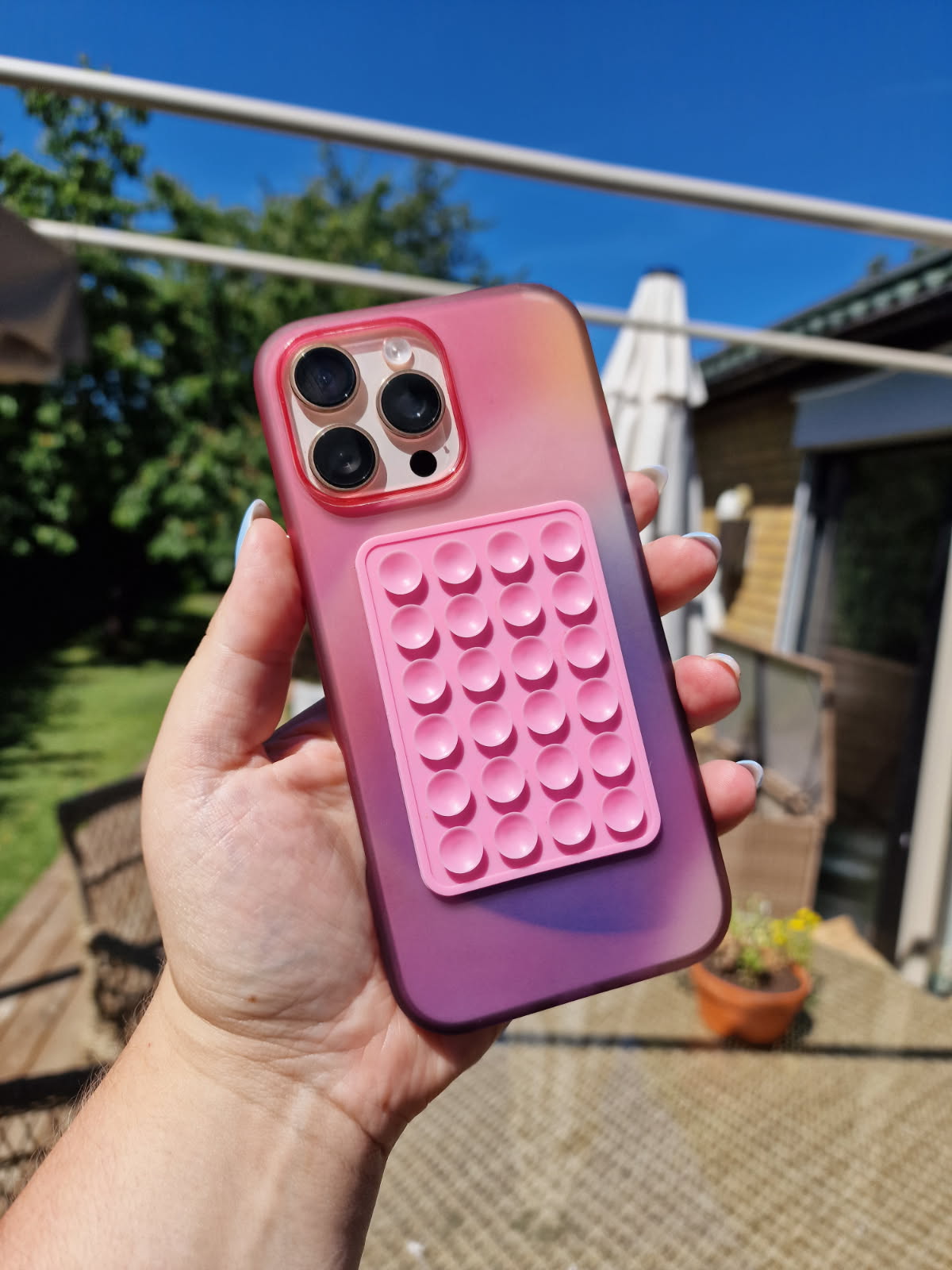 Sugproppshållare till mobil, med klister